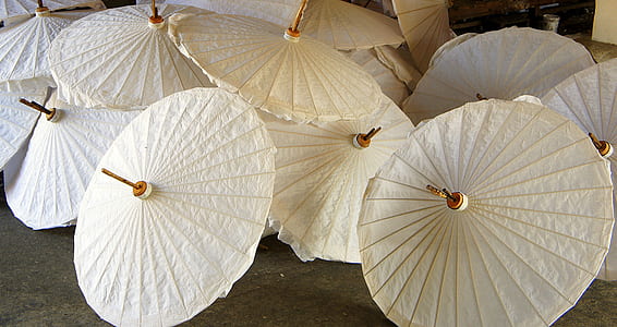 white umbrellas on floor thumbnail