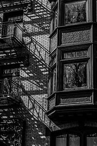 greyscale photo of residential building thumbnail
