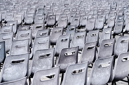lined up gray metal chair lot thumbnail