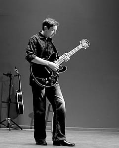 man playing guitar thumbnail