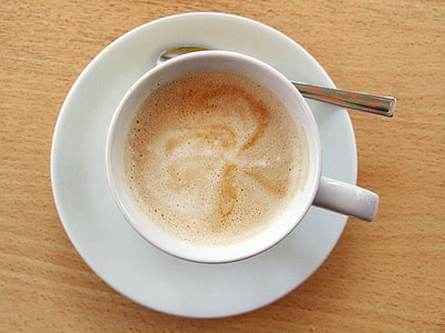 tea cup set on brown wooden surface thumbnail
