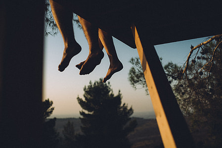 person sitting on roof thumbnail