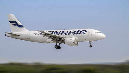 white and blue Finnair airplane at daytime thumbnail