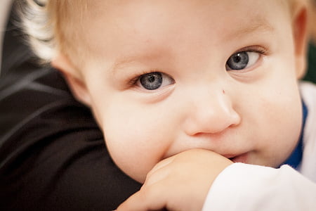 baby wearing white jacket thumbnail
