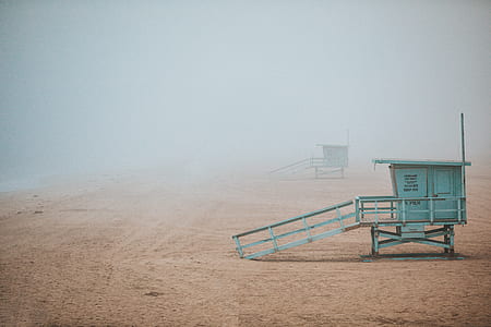 teal wooden seashore shed during daytime thumbnail