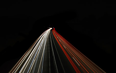 time lapse photography of vehicles passing thumbnail
