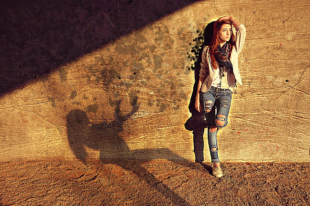 woman leaning on wall thumbnail