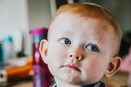 closeup photo of baby's face thumbnail