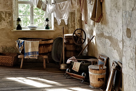 brown wooden barrel in the corner of a room thumbnail