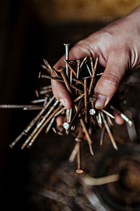 Tools, nails and bolts in a workshop thumbnail