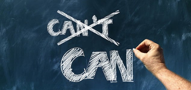 person writing on chalkboard cant't with x and can words thumbnail