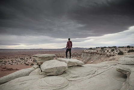 person standing near cliff thumbnail