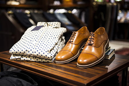 pair of brown leather dress shoes thumbnail