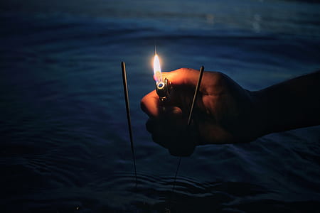 person about to light sparklers thumbnail
