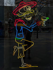skull holding martini glass neon signage thumbnail