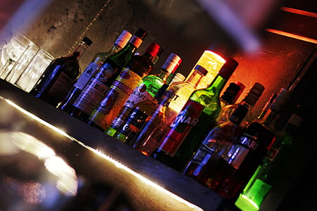 bottles placed on shelf with lights thumbnail