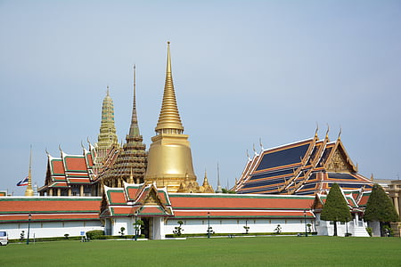 photo of orange and white building during daytime thumbnail