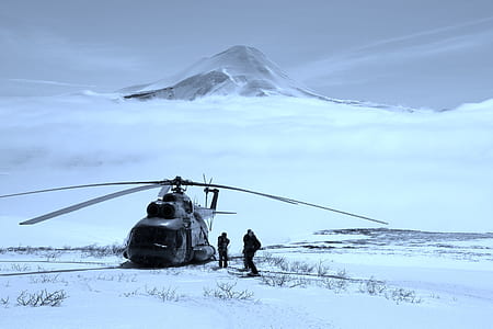 two person walking near helicopter thumbnail