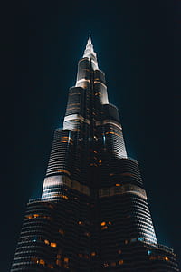 grey concrete building during night time thumbnail