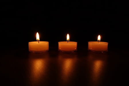 three orange candles thumbnail