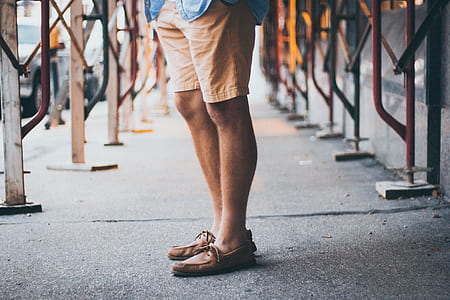 person wearing brown leather boat shoes thumbnail