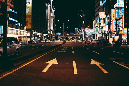 empty road between buildings thumbnail
