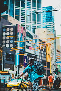 girl riding on black hardtail bicycle thumbnail