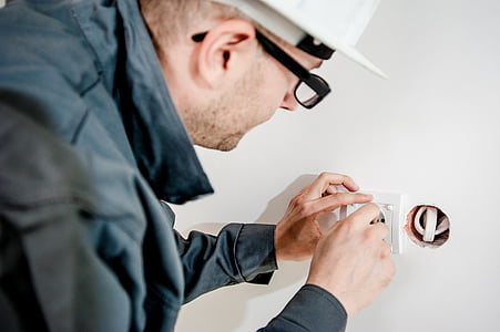 man installing electric wire thumbnail