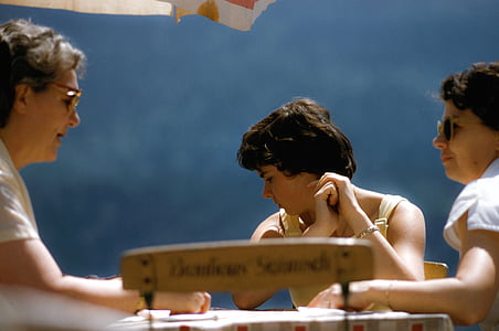 three women sitting in front of table at daytime thumbnail