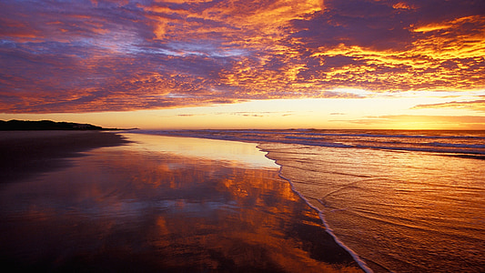 landscape photo of body of water during golden hour thumbnail
