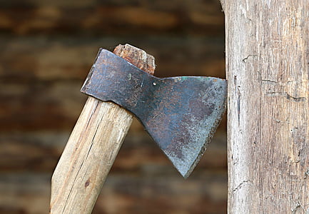 black hatchet on brown wood thumbnail