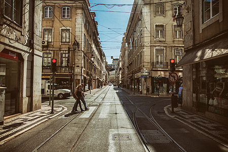 Street shot showing the red lights at a traffic signal in Lisbon, Portugal thumbnail