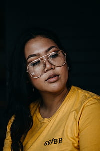 woman in eyeglasses with silver-colored frames thumbnail