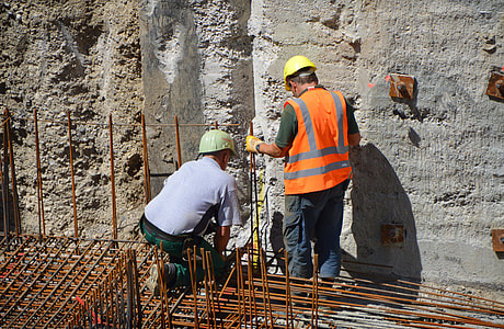 two men fixing concrete bars thumbnail