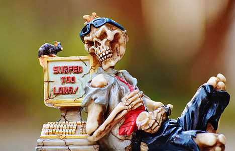 skeleton and cash register figurine thumbnail