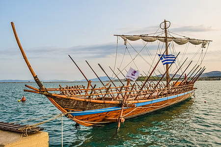 brown wooden boat on dock thumbnail
