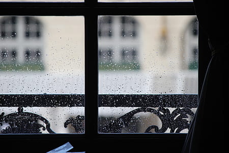 selective focus photography of clear window covered with water dew thumbnail