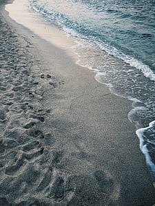 waves beside seashore thumbnail
