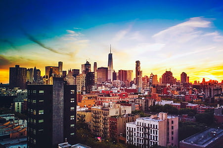 photography of high rise buildings during golden hour thumbnail
