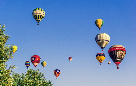 hot air balloons flying in the sky thumbnail