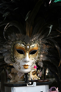 selective focus of white and gold masquerade thumbnail
