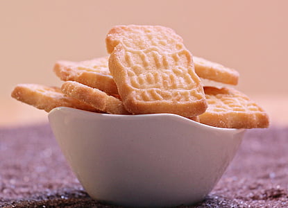 brown biscuit lot on white ceramic bowl thumbnail