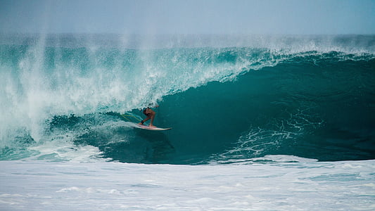 person surfing on body of water thumbnail