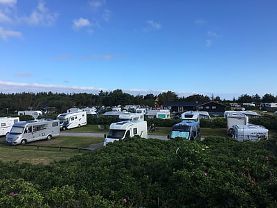 vehicles parked on green rtoad thumbnail