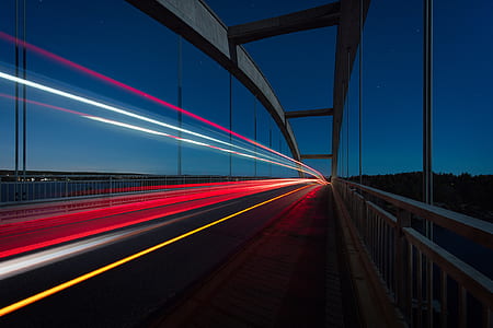 time lapse photo of lights on bridge thumbnail