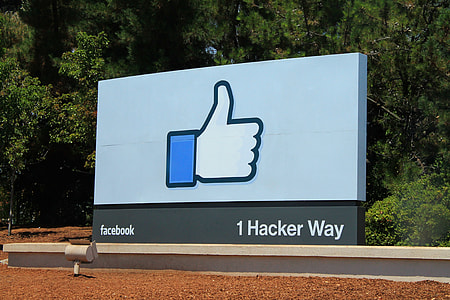 photo of Facebook like emoji graffiti during daytime thumbnail