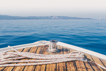 boat in sea during daytime thumbnail