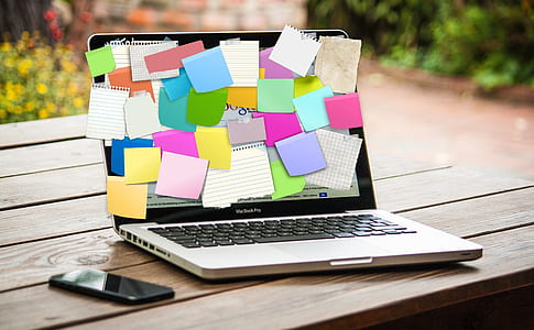 MacBook Pro full of sticky notes thumbnail