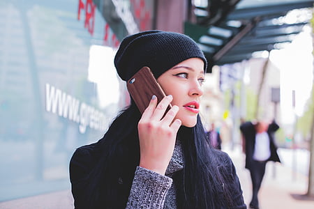 woman holding smartphone thumbnail