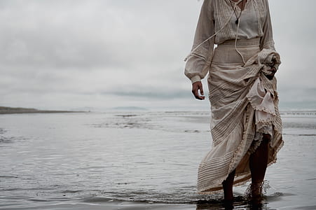 woman standing near shore thumbnail